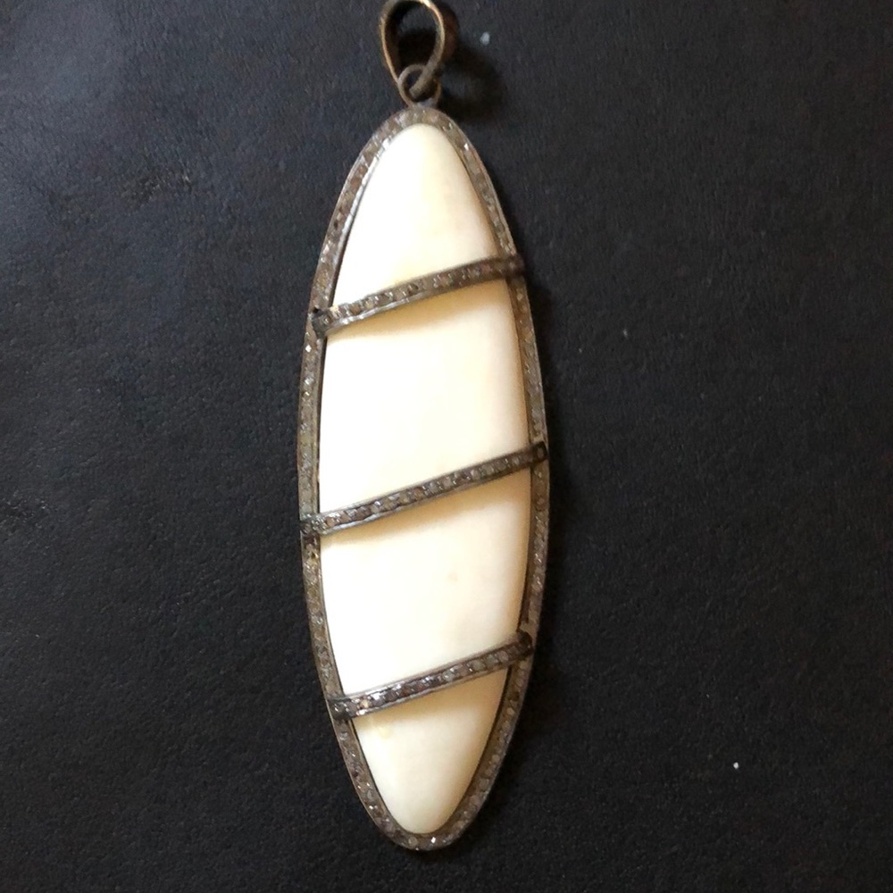 Diamond Pave and Bone Pendant.